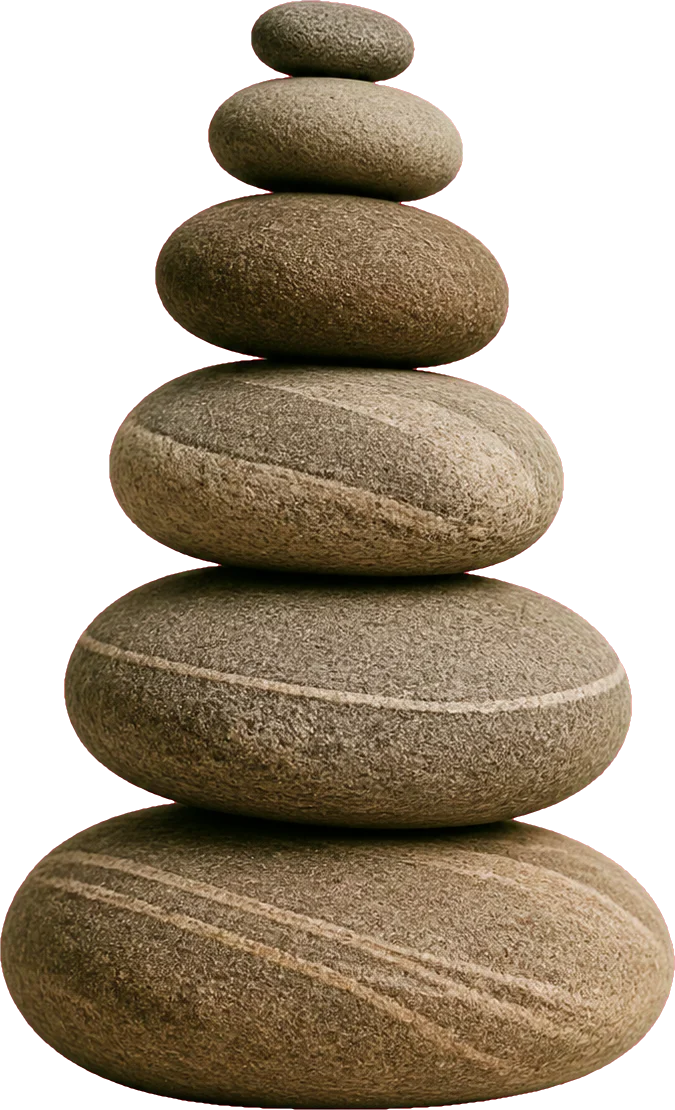 Six river stones balanced in a single column